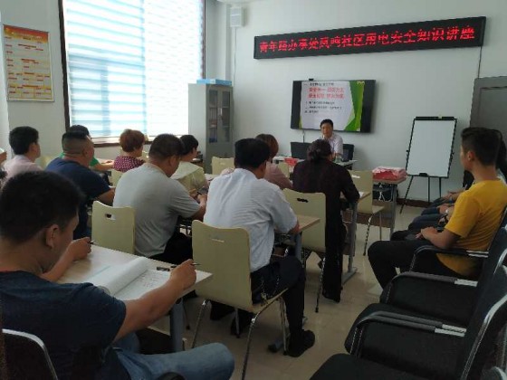 机电工程系党支部老师学生走进社区志愿服务