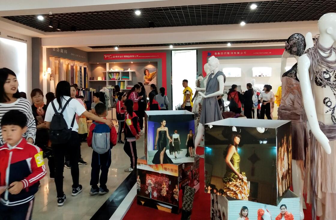 纺织服装工程系职业教育活动周体验日现场报道